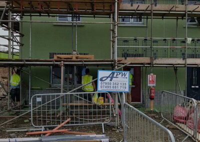 Green Coloured Spray Render Residential Estate Fishguard - APW Homes