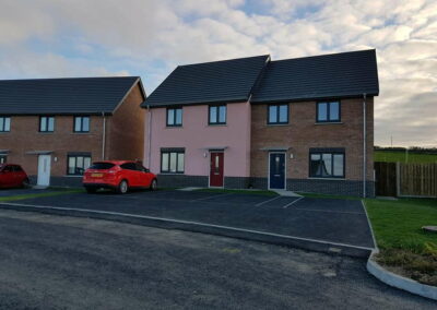 Coloured Spray Render Residential Estate Fishguard - APW Homes