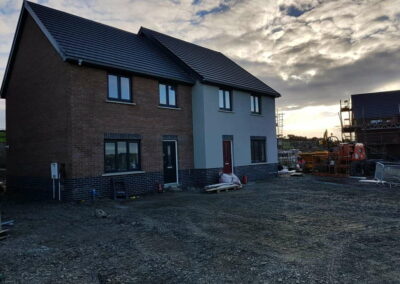 Coloured Spray Render Residential Estate Fishguard - APW Homes