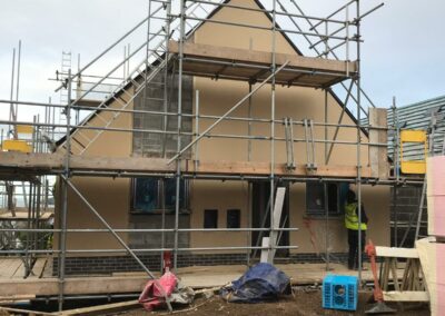 yellow Roughcast Render Newport Pembs - APW Homes 10