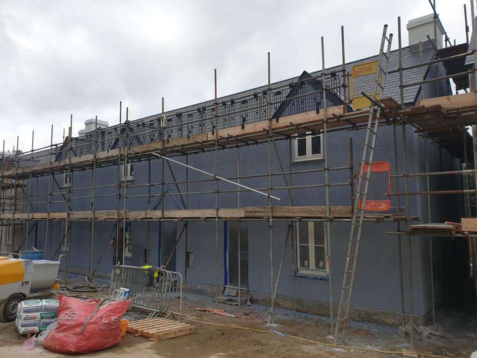 Roughcast Render Newport Pembs - Rendered homes with scaffolding up