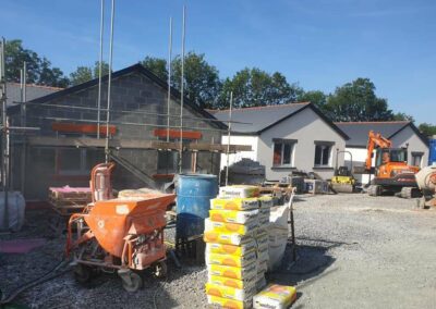 Weber Chalk render bags ready on site of Bungalows Kilgetty
