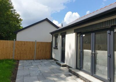 Weber Chalk Bungalows Kilgetty - rear garden windows out
